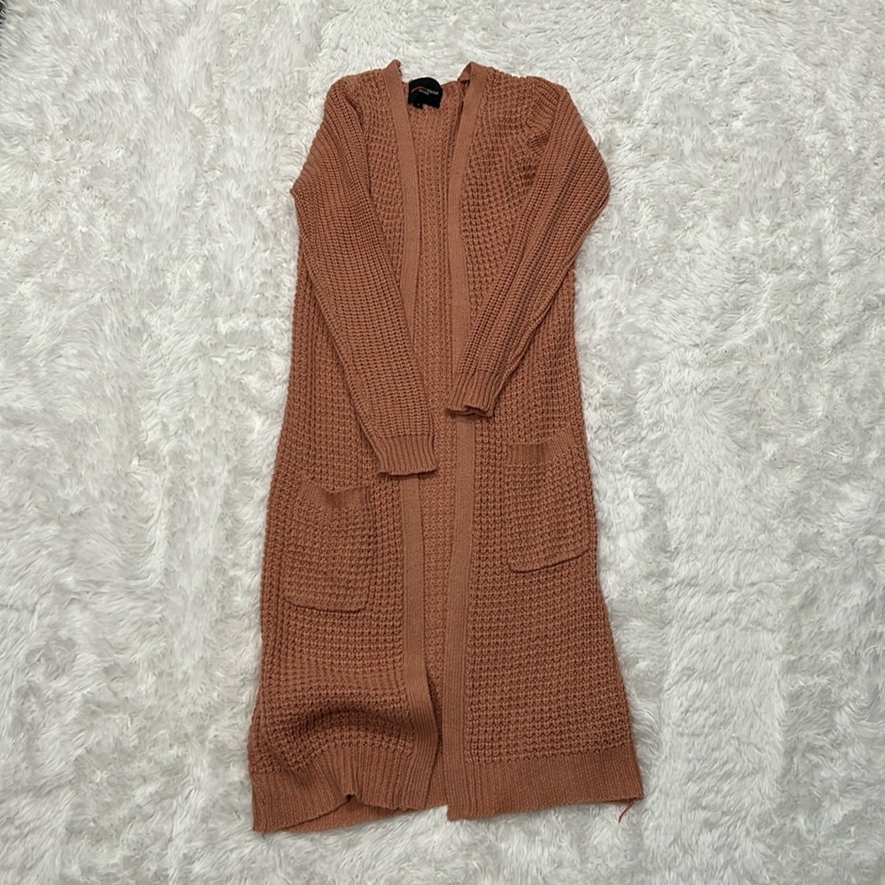 Pink cardigan sweater